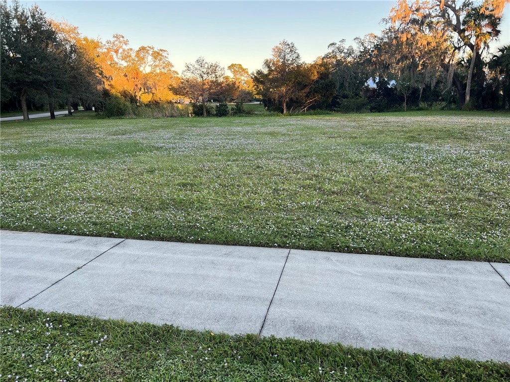 11324 Ganesh Way Sebastian, FL 32958 - Photo 11 of 15 a view of a field with grass