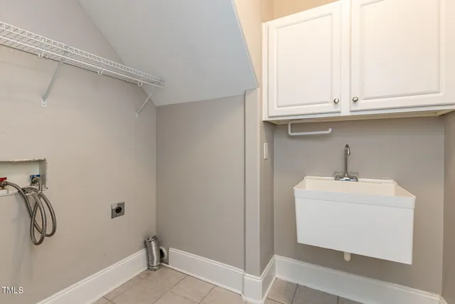 a bathroom with a sink and vanity