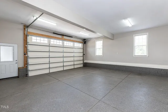 a view of a livingroom with an empty space and window