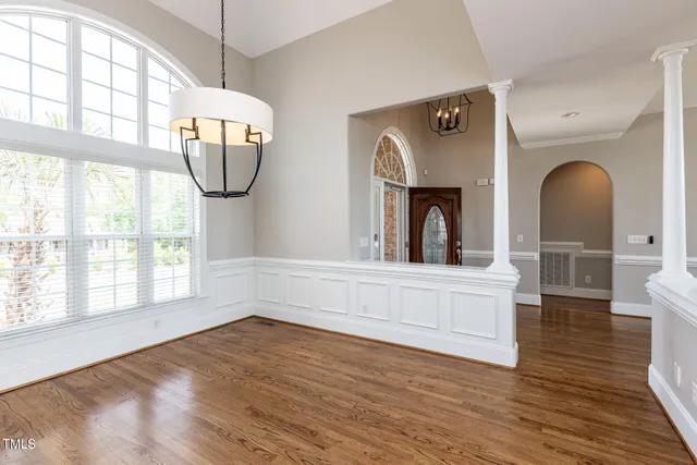 a view of living room with furniture and window