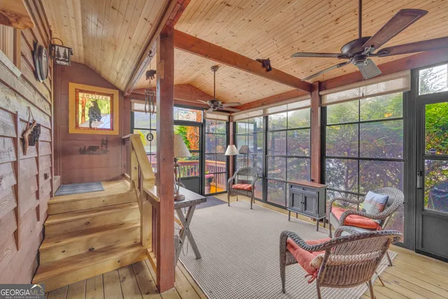 a view of balcony and small yard