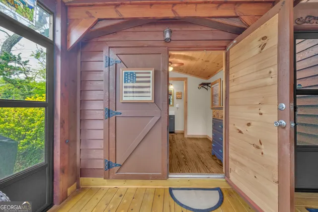 a bed room with a bed and a window