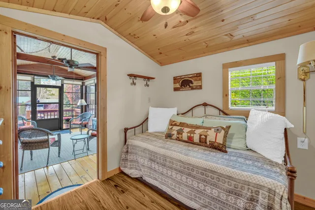 a bathroom with a toilet a sink and shower