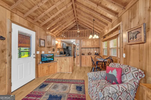 a kitchen with stainless steel appliances granite countertop a stove and cabinets