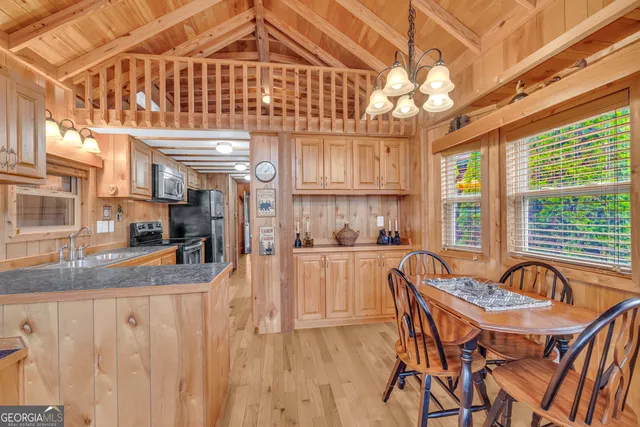 a kitchen with a stove and a refrigerator