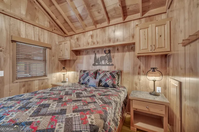 a view of staircase with white walls