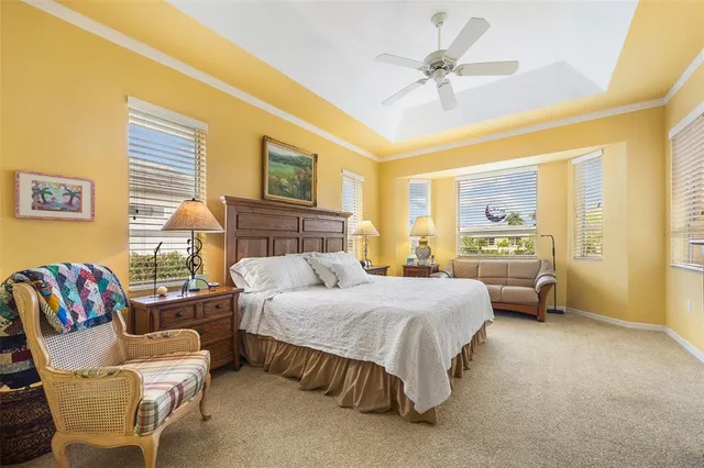 a bedroom with a bed and a couch