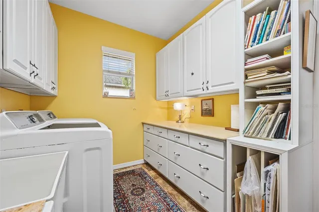 a view of a kitchen area and microwave
