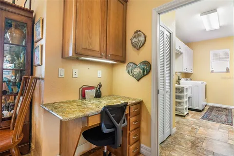 a view of a livingroom with furniture and window