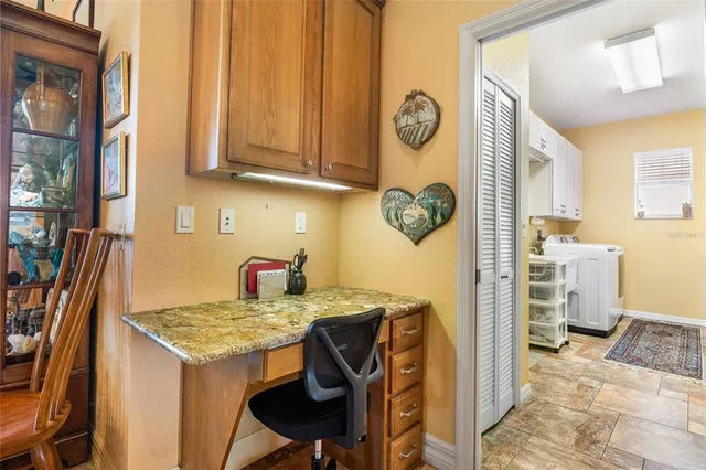 a view of a livingroom with furniture and window