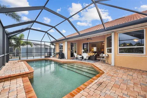 a view of a swimming pool with a porch
