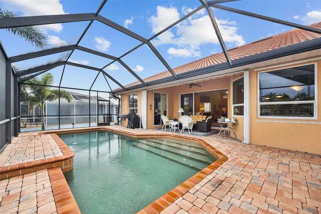 a view of a swimming pool with a porch