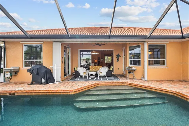 a view of a lake with a house in the background