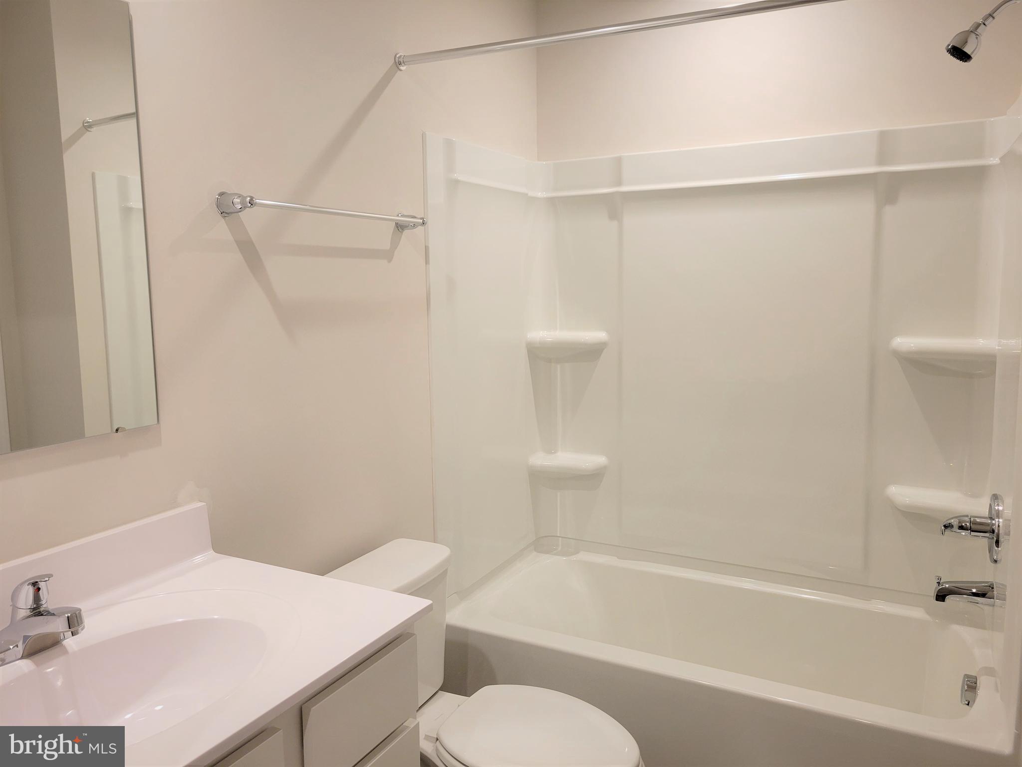 28 Mulberry Lane Clementon, NJ 08021 - Photo 8 of 21 a bathroom with a sink toilet and shower