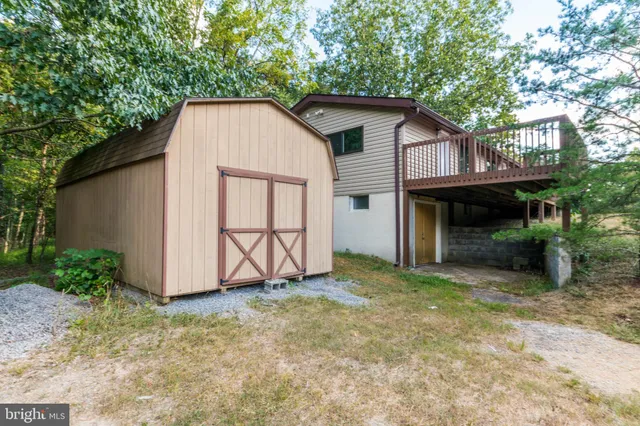 a house with a tree in the background