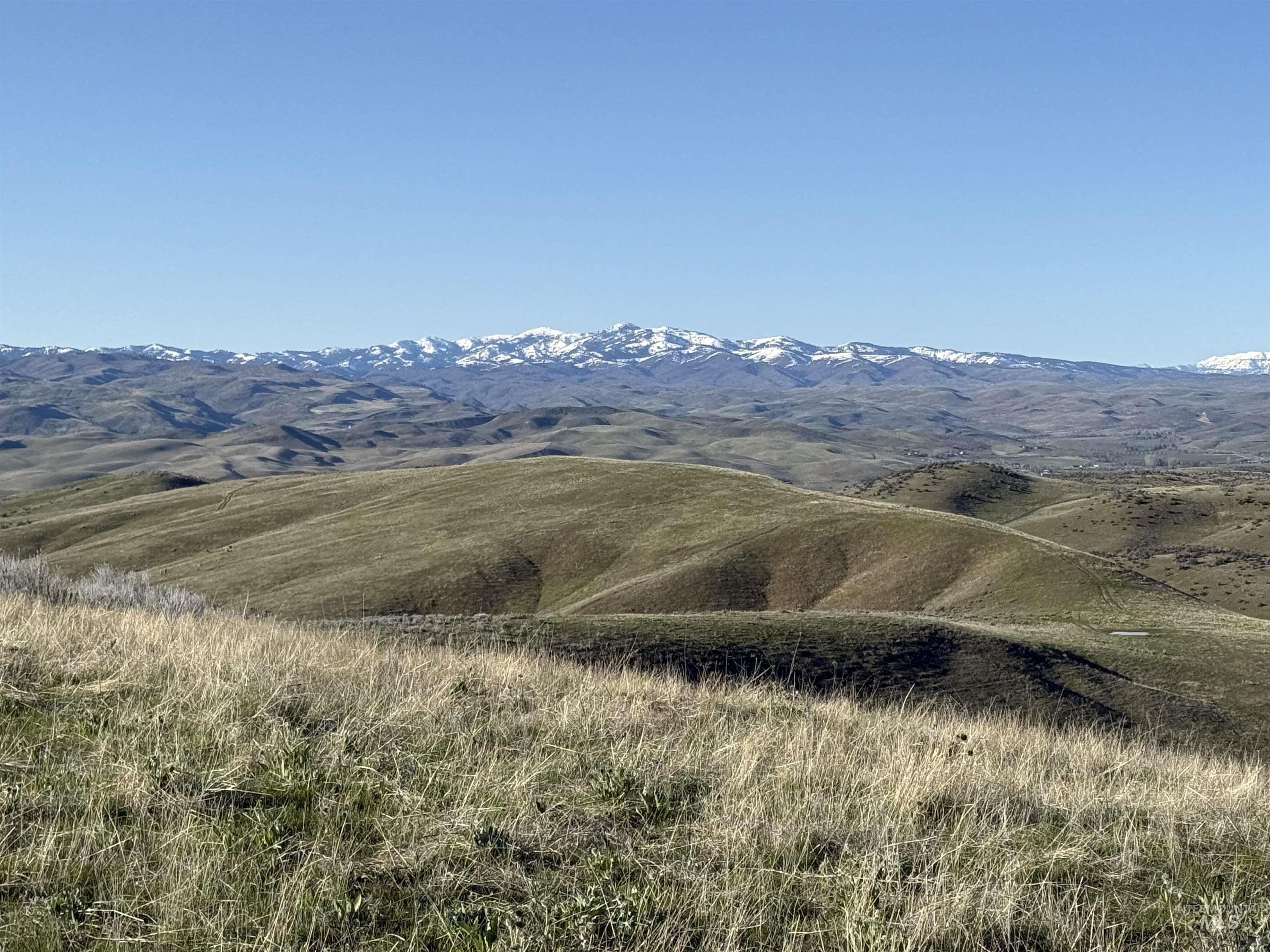 1854 Guilford Road Weiser, ID 83672 - Photo 2 of 33 View of mountain backdrop featuring rural landscape