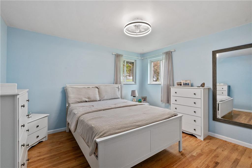5431 Hamilton Road Gibsonia, PA 15044 - Photo 15 of 28 a bedroom with a bed and a dresser