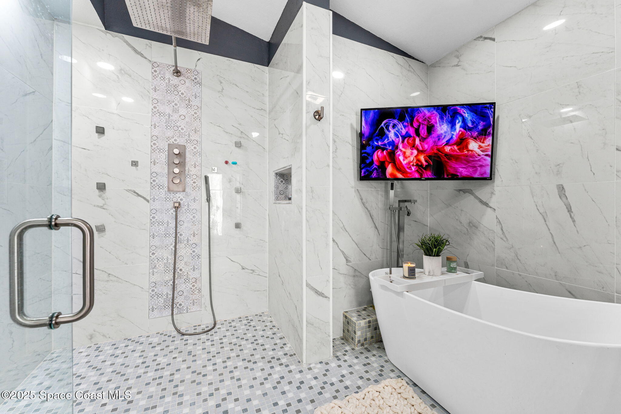 1292 Brumpton Place Rockledge, FL 32955 - Photo 23 of 69 a bathroom with a bathtub and shower