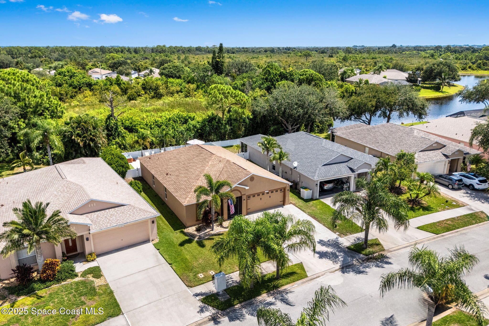 1292 Brumpton Place Rockledge, FL 32955 - Photo 47 of 69 an aerial view of a house with a garden