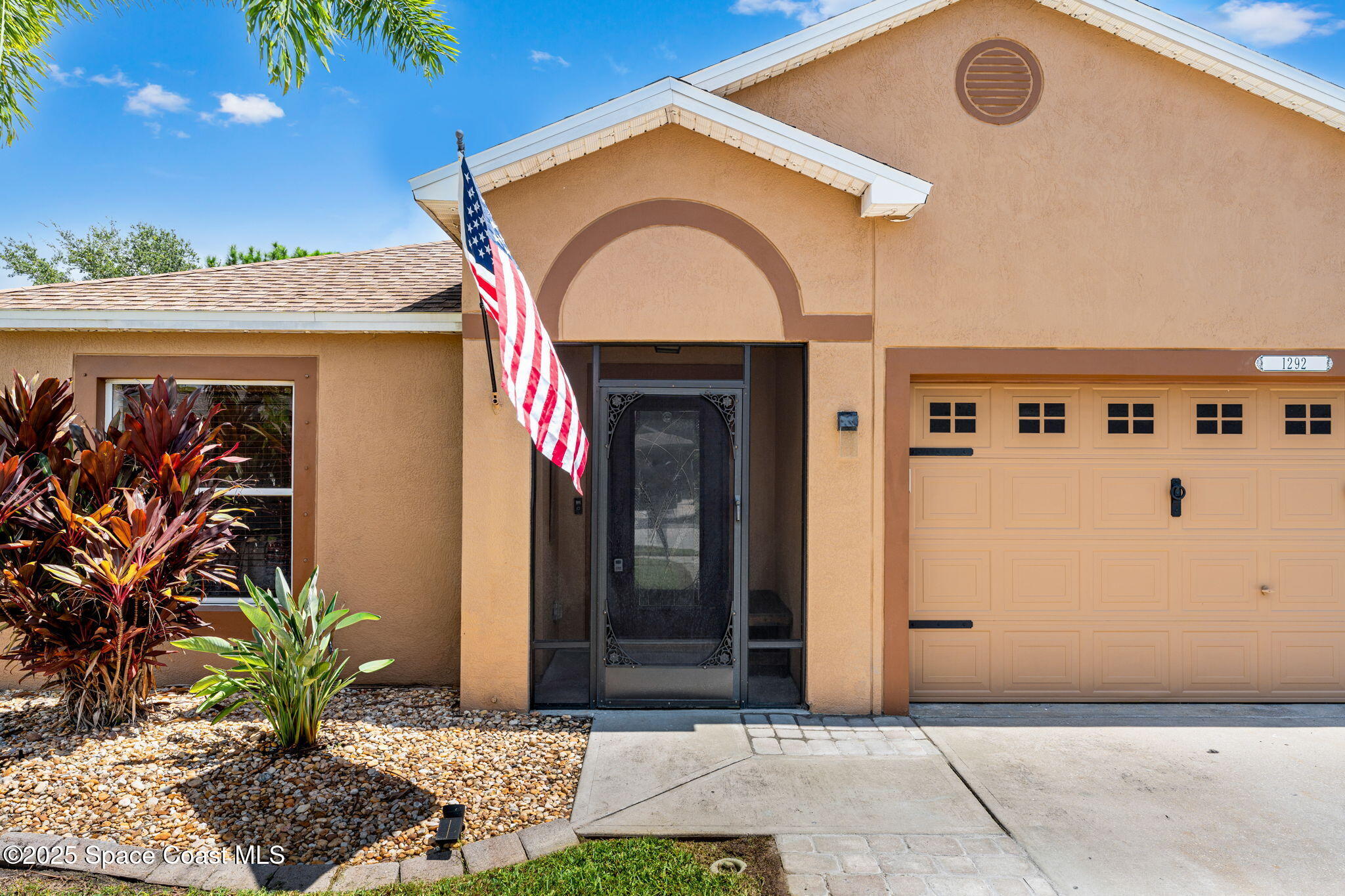 1292 Brumpton Place Rockledge, FL 32955 - Photo 48 of 69 a view of a door of the house