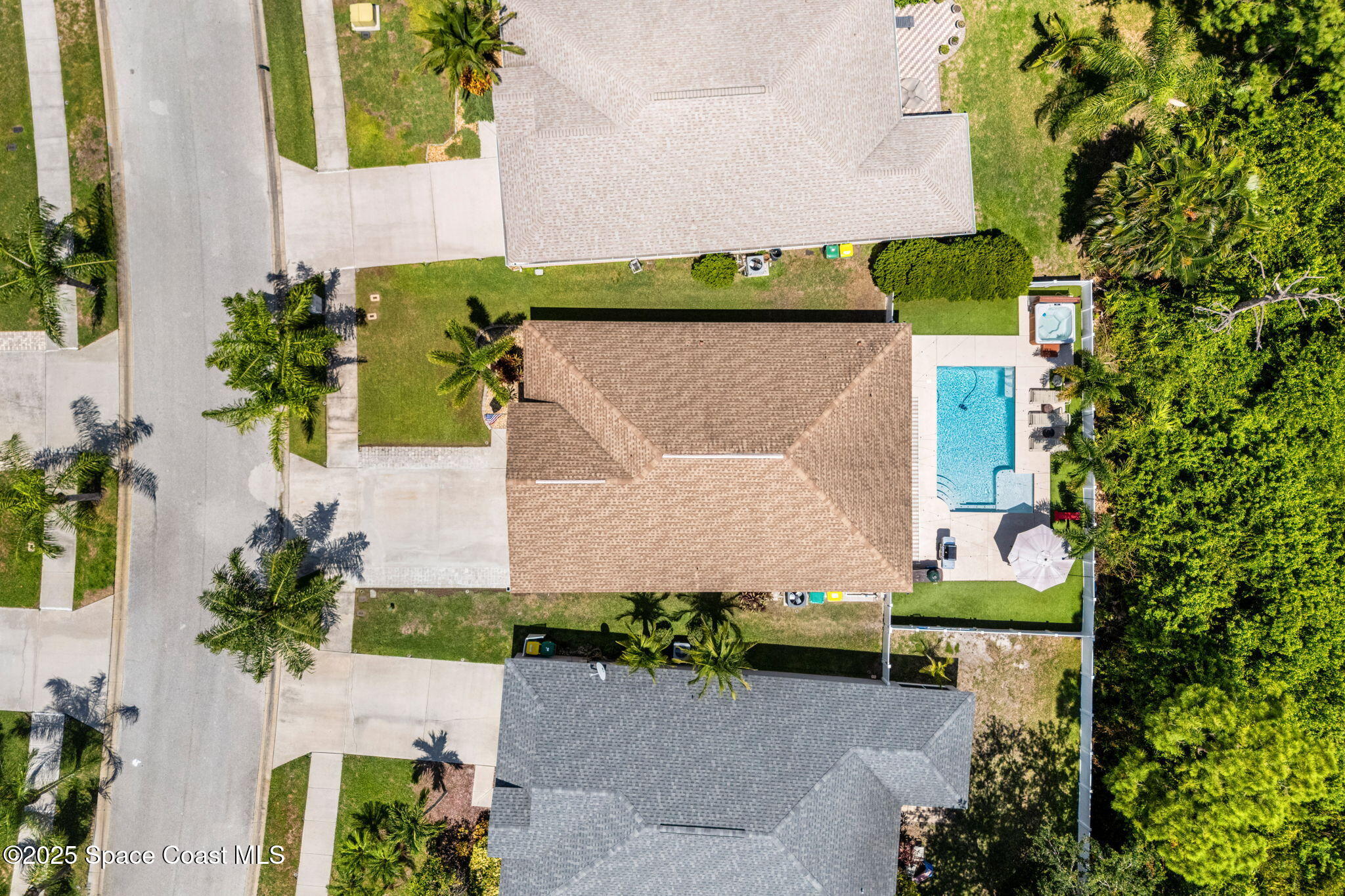 1292 Brumpton Place Rockledge, FL 32955 - Photo 51 of 69 an aerial view of a house with a garden and a yard