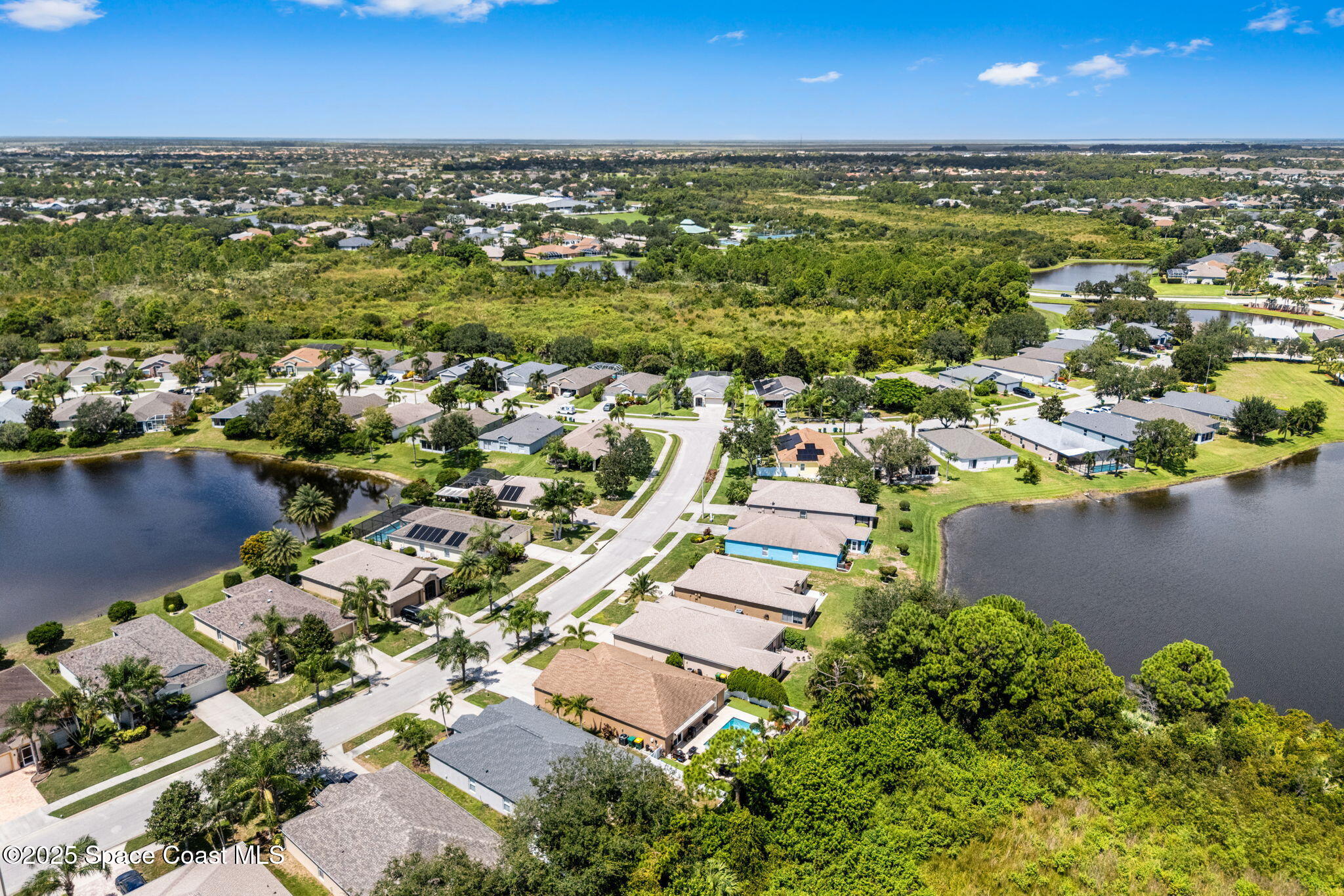 1292 Brumpton Place Rockledge, FL 32955 - Photo 52 of 69 an aerial view of residential houses with outdoor space
