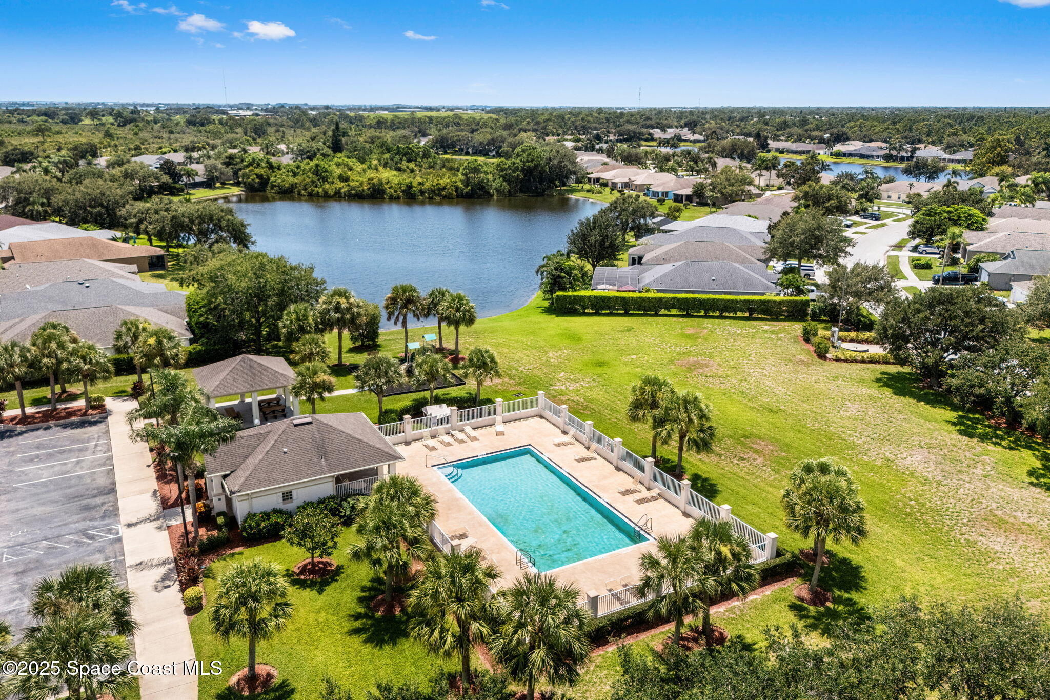 1292 Brumpton Place Rockledge, FL 32955 - Photo 60 of 69 an aerial view of residential houses with outdoor space and river view
