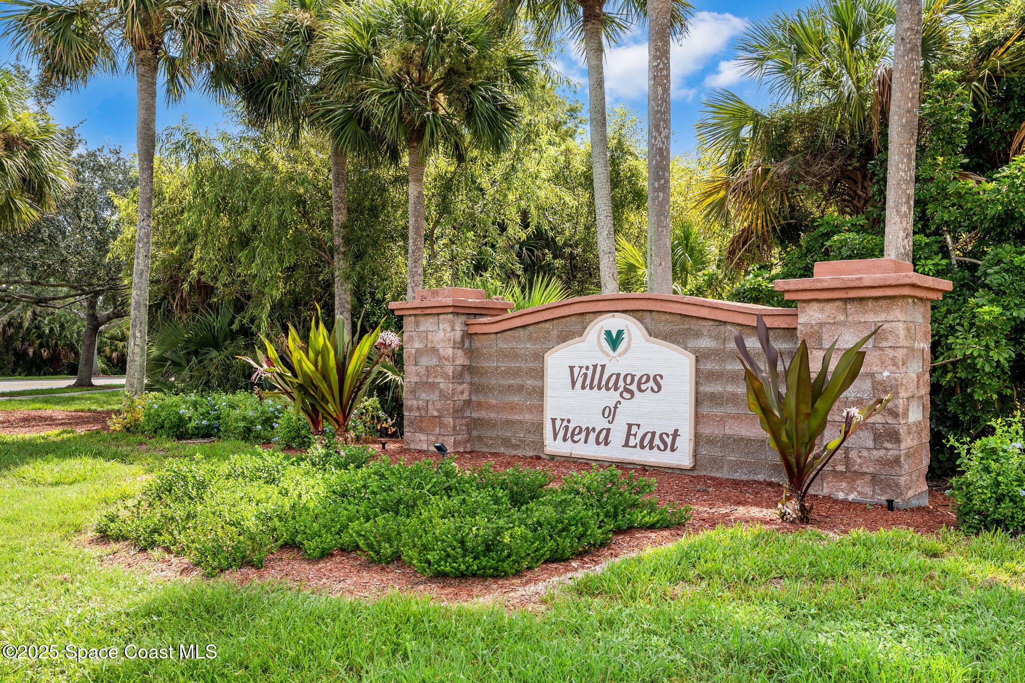 1292 Brumpton Place Rockledge, FL 32955 - Photo 62 of 69 a sign on the side of the road