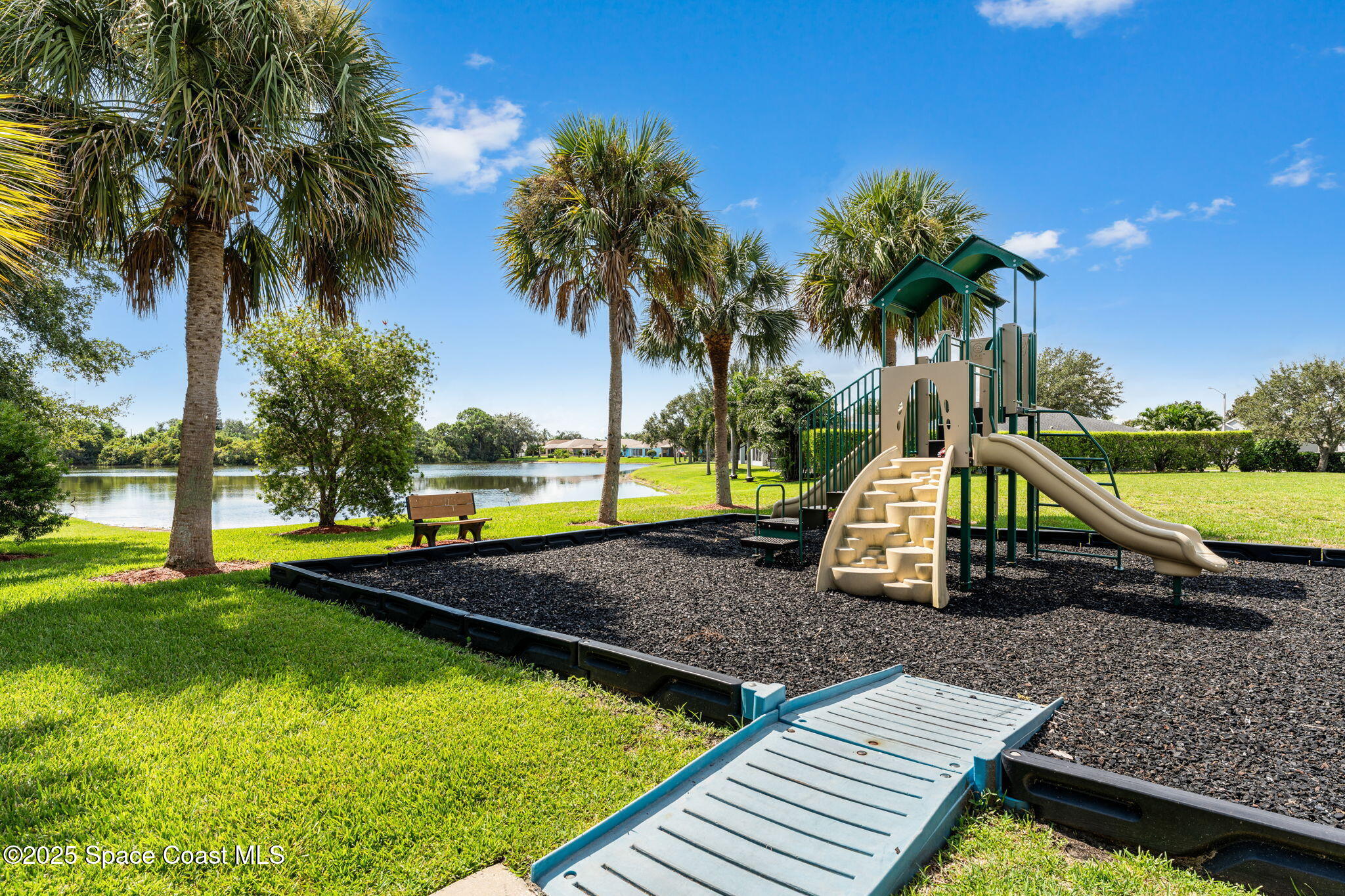 1292 Brumpton Place Rockledge, FL 32955 - Photo 66 of 69 a view of a backyard with swimming pool