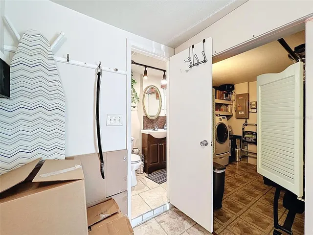 a bathroom with a sink and mirror