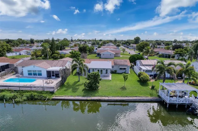 an aerial view of a house with a garden