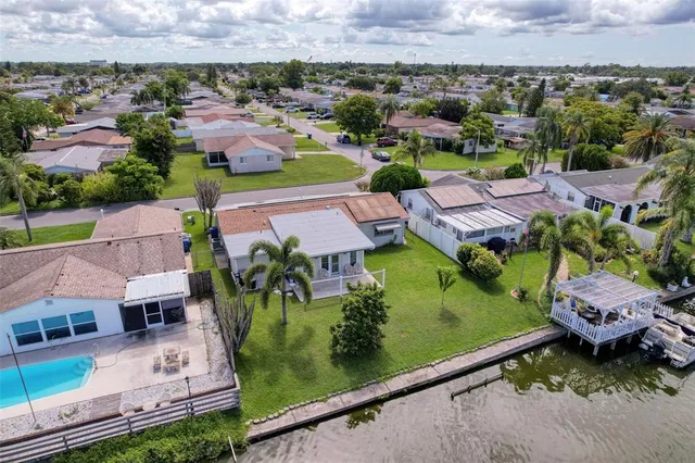an aerial view of a house with a garden