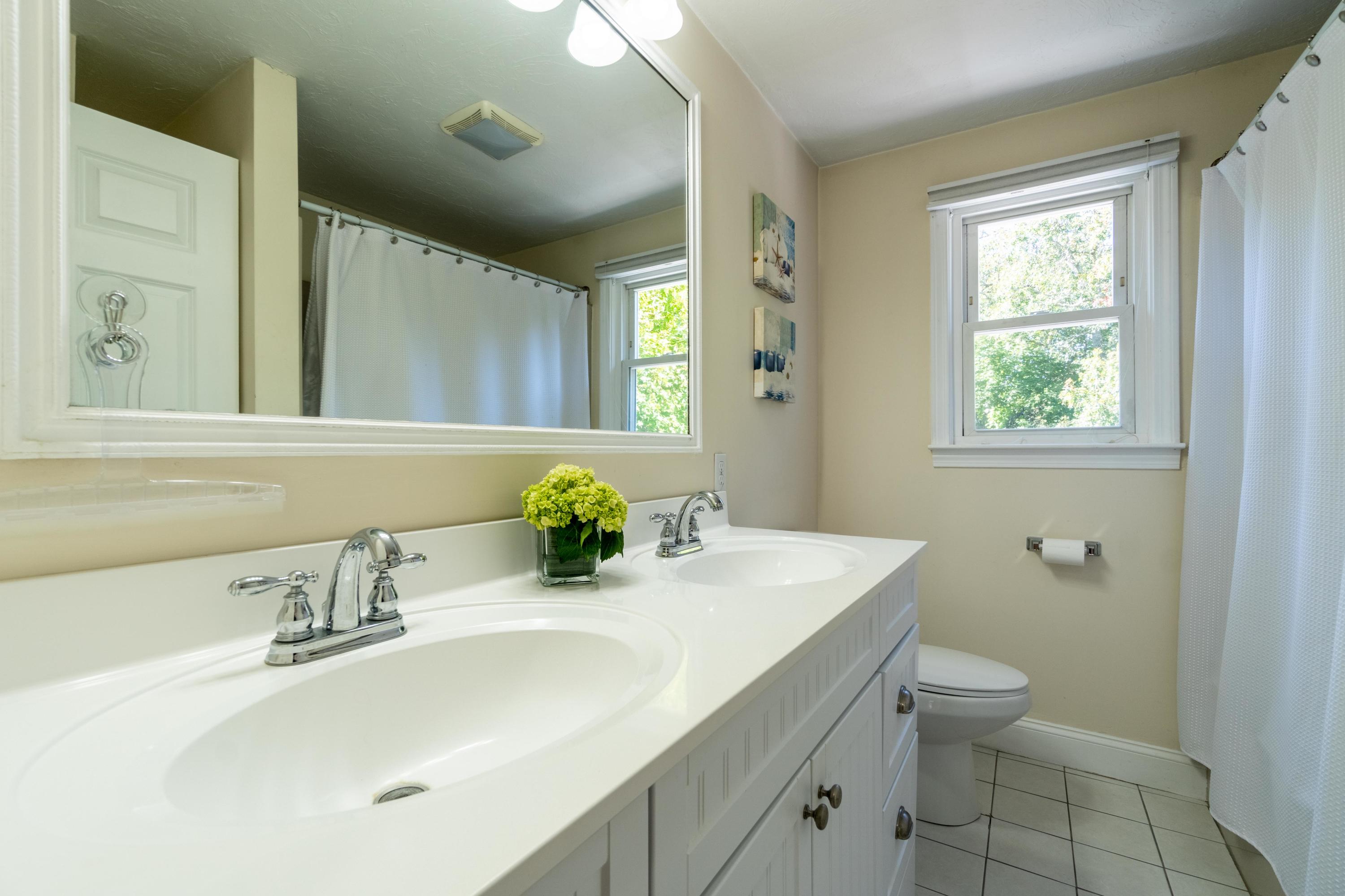 85 Old Town Road Hyannis, MA 02601 - Photo 14 of 26 a bathroom with a sink toilet and a mirror