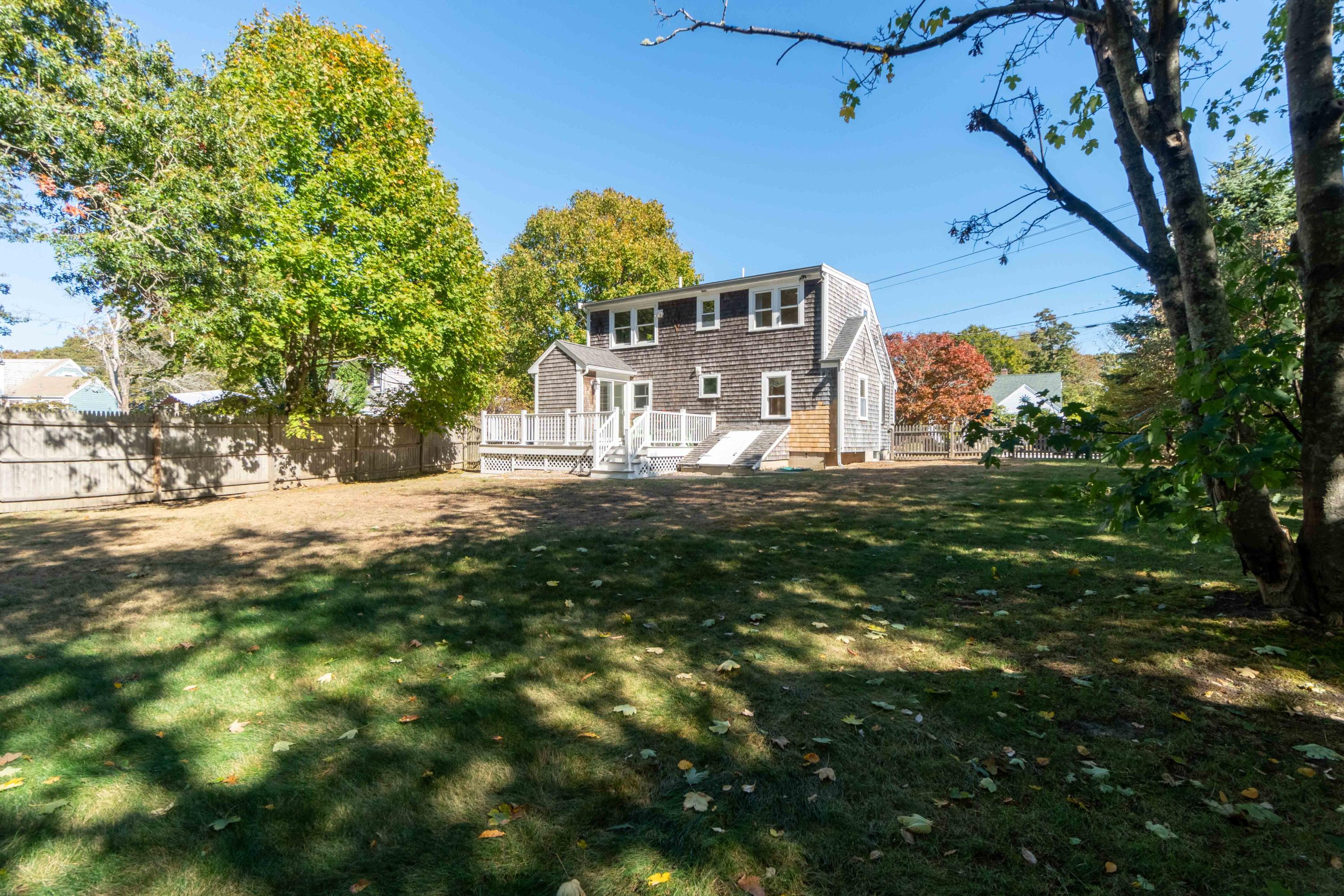 85 Old Town Road Hyannis, MA 02601 - Photo 22 of 26 a view of a large building with a big yard
