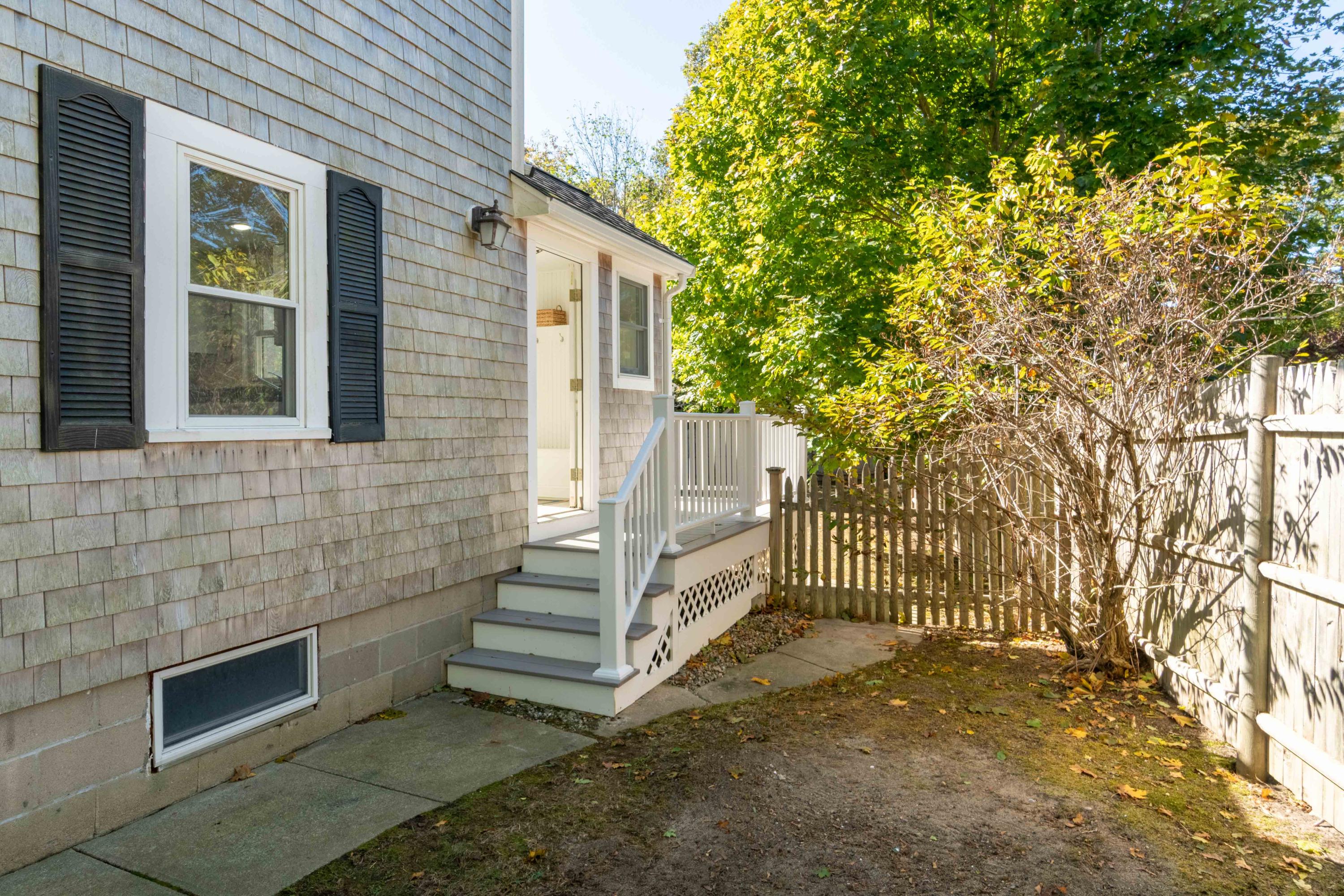 85 Old Town Road Hyannis, MA 02601 - Photo 25 of 26 a view of house with backyard and a trees