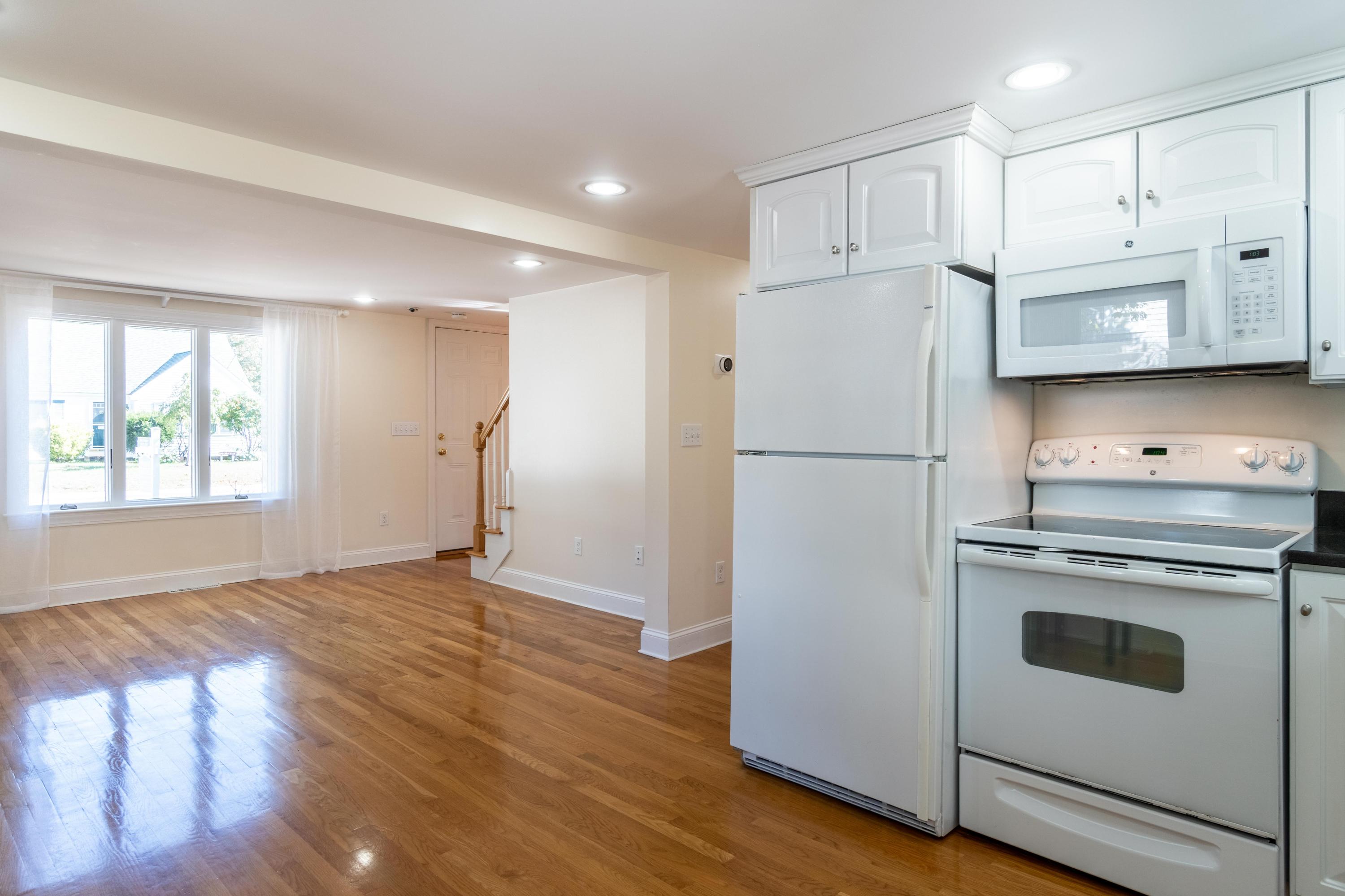 85 Old Town Road Hyannis, MA 02601 - Photo 6 of 26 a kitchen with granite countertop white cabinets and white stainless steel appliances