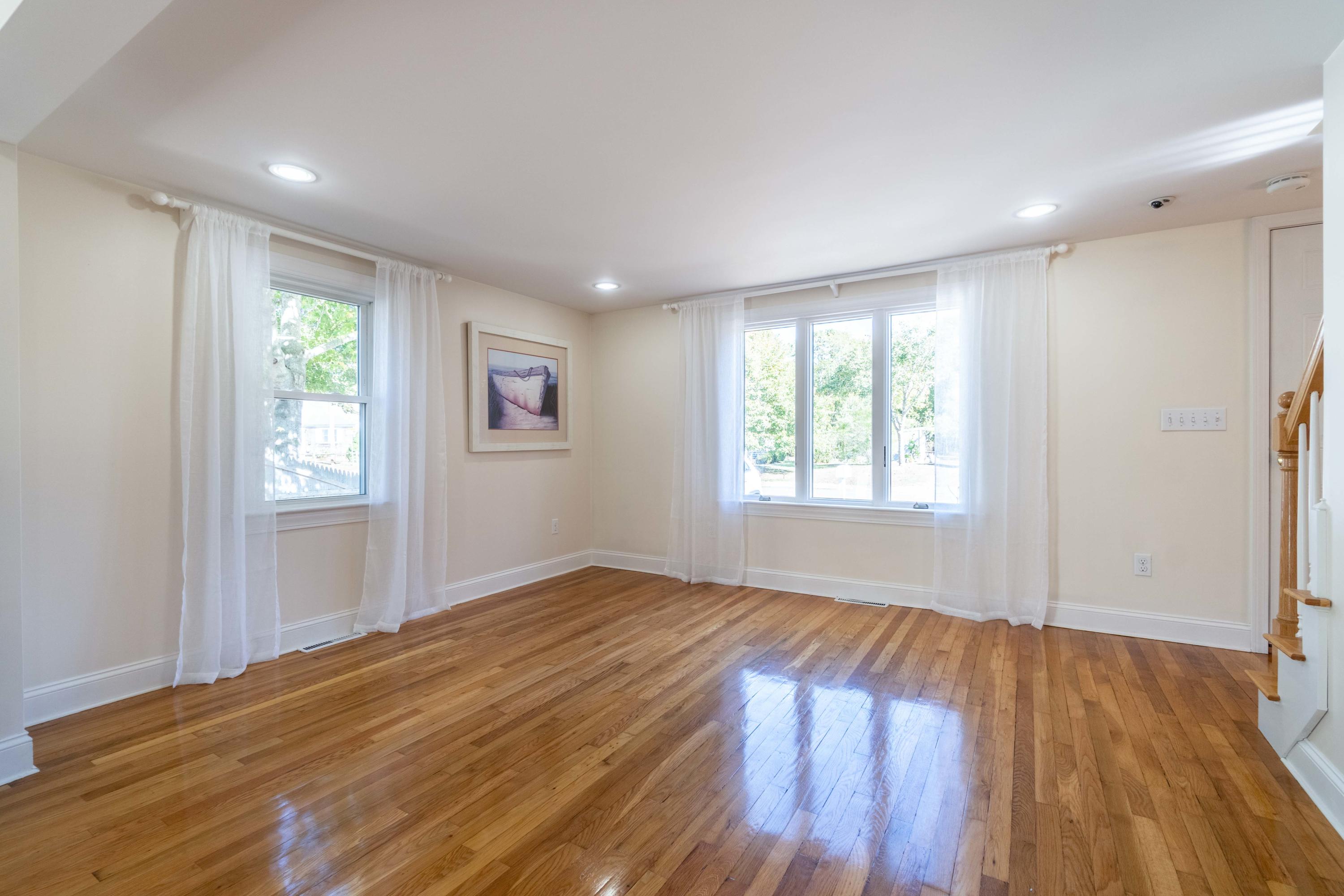 85 Old Town Road Hyannis, MA 02601 - Photo 9 of 26 an empty room with wooden floor and windows