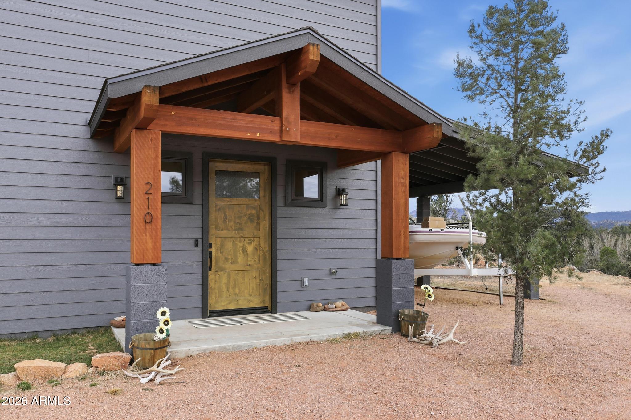 210 Valley Road Payson, AZ 85541 - Photo 5 of 38 a front view of a house with garden