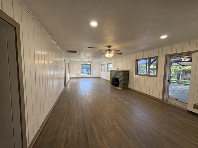 4876 East Williams Spring Road Fort Worth, TX 76135 - Photo 6 of 20 a view of a hallway with wooden floor and staircase