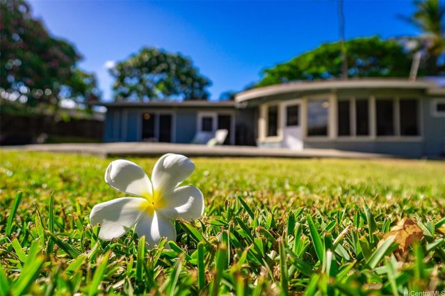 a view of a house with swimming pool