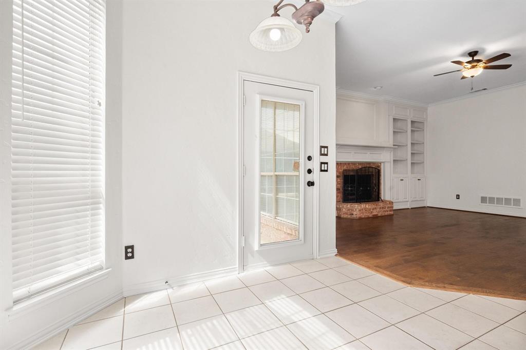 4512 Crown Ridge Drive Plano, TX 75024 - Photo 14 of 32 a view of a livingroom with a fireplace
