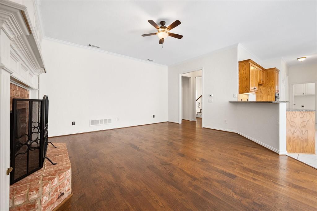 4512 Crown Ridge Drive Plano, TX 75024 - Photo 16 of 32 a view of empty room with wooden floor