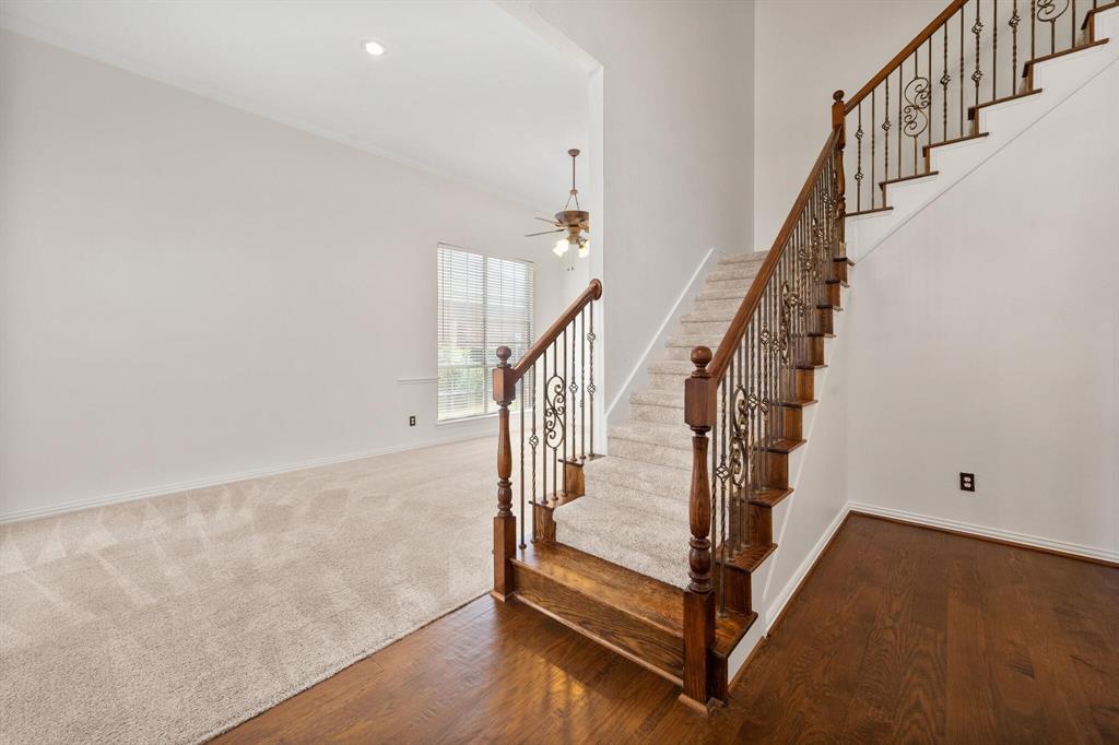 4512 Crown Ridge Drive Plano, TX 75024 - Photo 4 of 32 a view of entryway with wooden floor