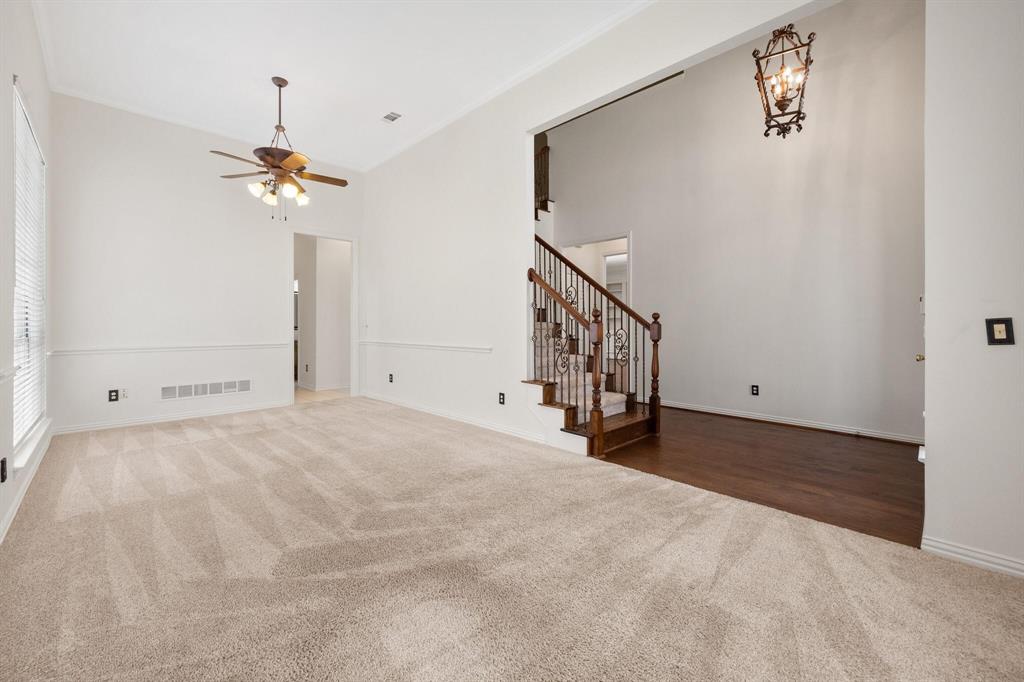 4512 Crown Ridge Drive Plano, TX 75024 - Photo 5 of 32 a view of a room with a ceiling fan