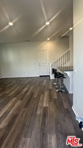 a view of livingroom with furniture and wooden floor
