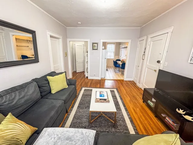 a living room with furniture and a couch