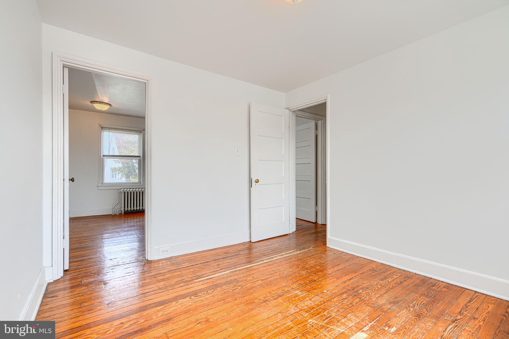 30 Portship Road Baltimore, MD 21222 - Photo 14 of 33 an empty room with wooden floor and closet