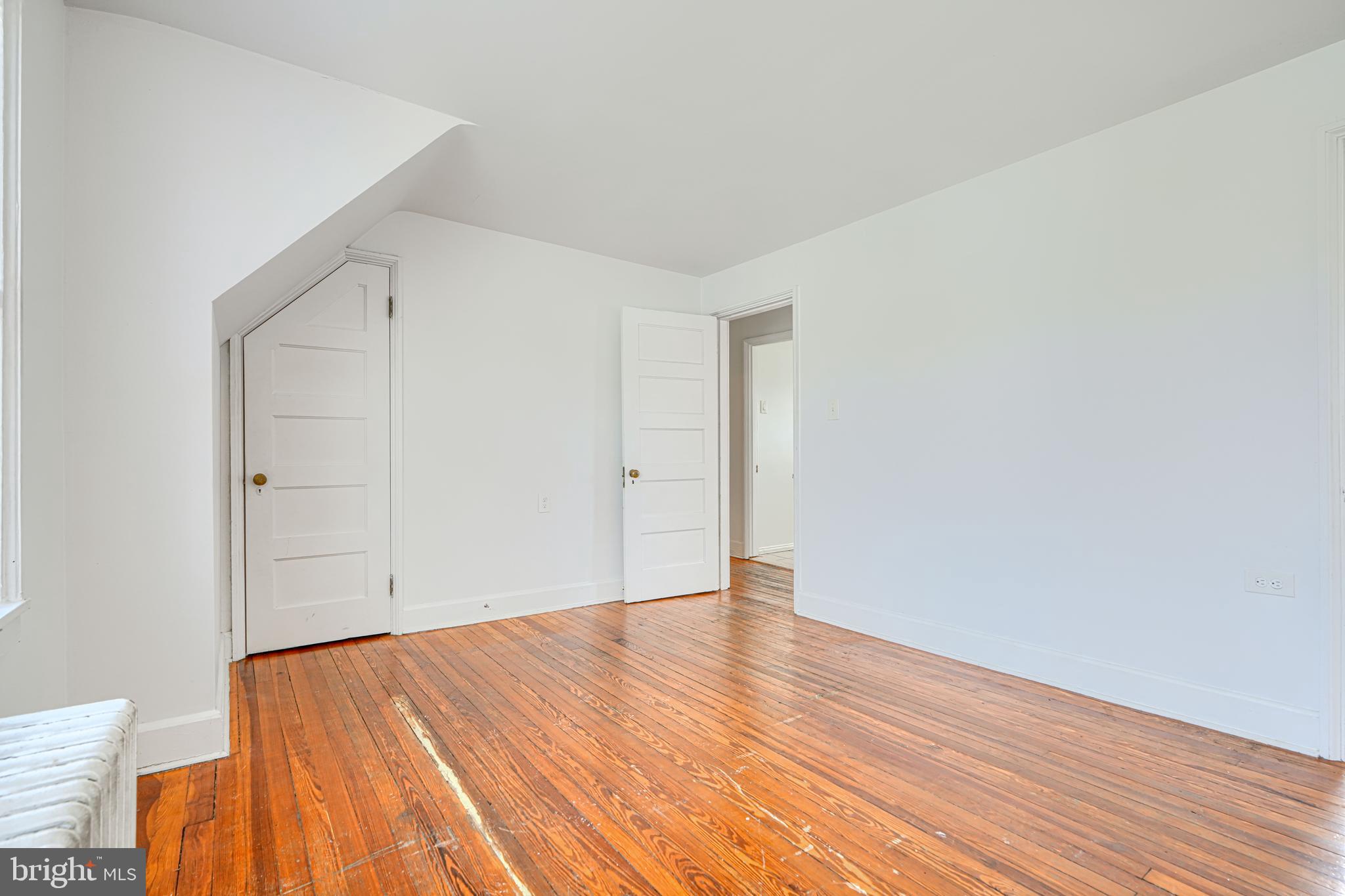 30 Portship Road Baltimore, MD 21222 - Photo 17 of 33 a view of an empty room with wooden floor