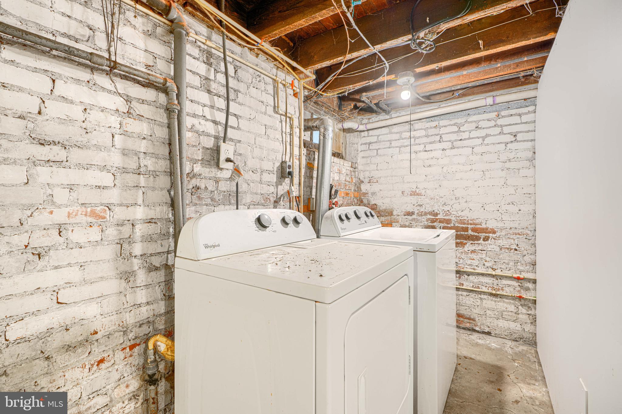30 Portship Road Baltimore, MD 21222 - Photo 26 of 33 a utility room with a sink dryer and washer