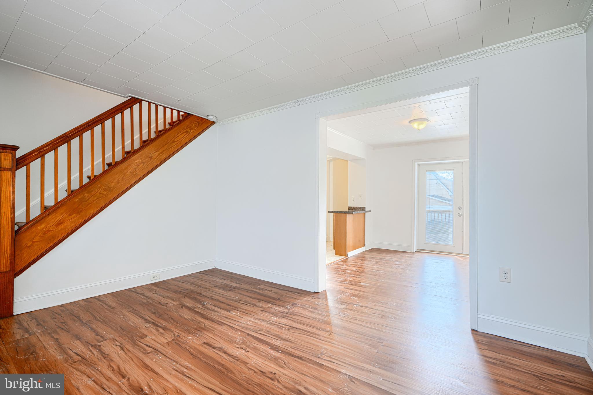 30 Portship Road Baltimore, MD 21222 - Photo 4 of 33 a view of an empty room with wooden floor
